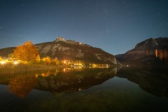 Moon-lit Loser and stars reflect in Altausseersee, Austria