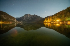 Stars and mountains reflect in Altausseersee, Austria