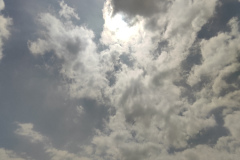 Clouds covering the sun only minutes before totality